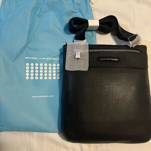 Brand new cross body bag .